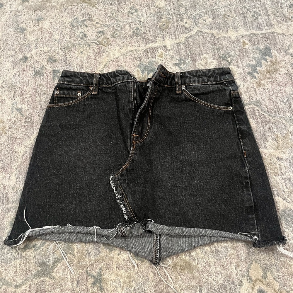 Black denim mini skirt